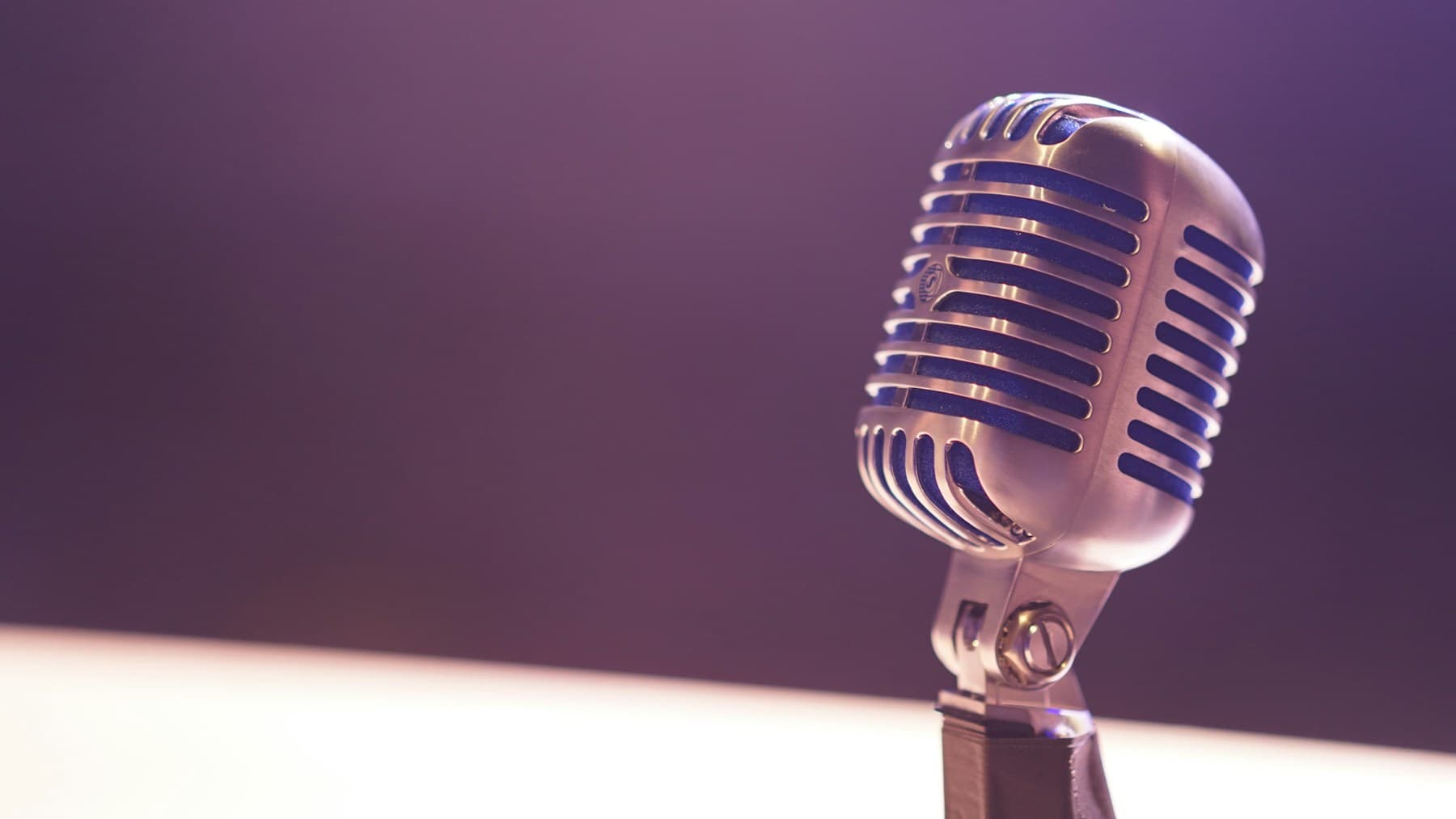 A microphone ready for a considered podcast conversation